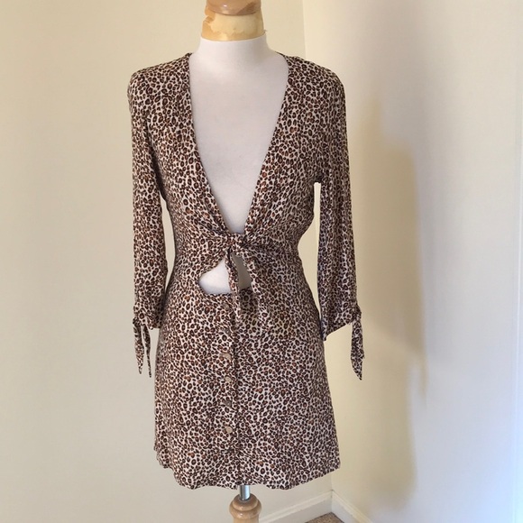 Skylar +Madison medium animal print deep neck front tie dress. - Picture 1 of 9